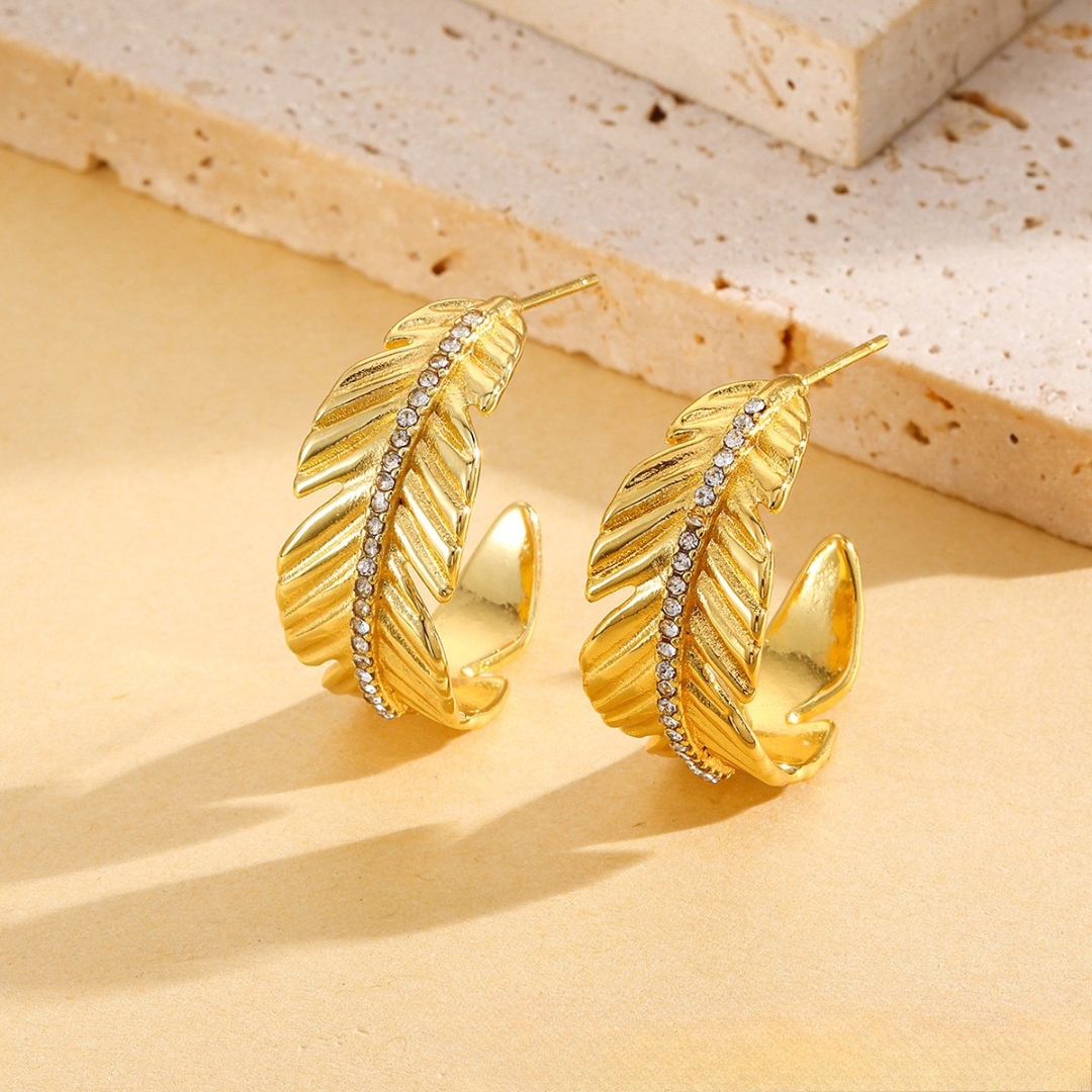 <tc>Pluma Cresta Pendientes</tc>