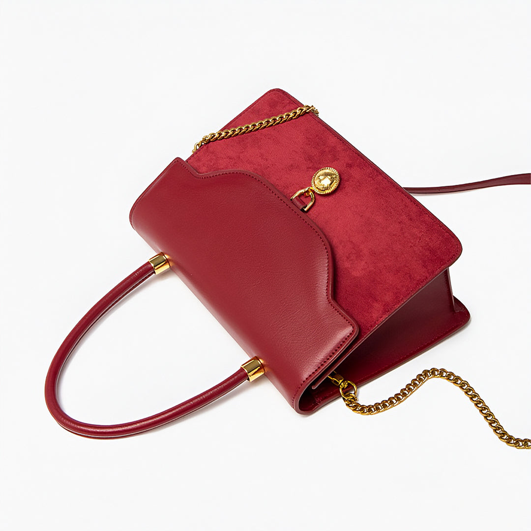 Regal Charm Suede Handbag